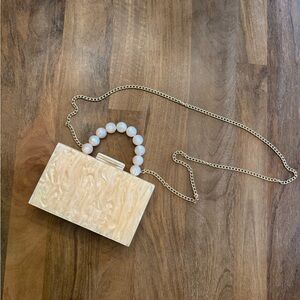 Elegant Cream Clutch with Pearl Handle